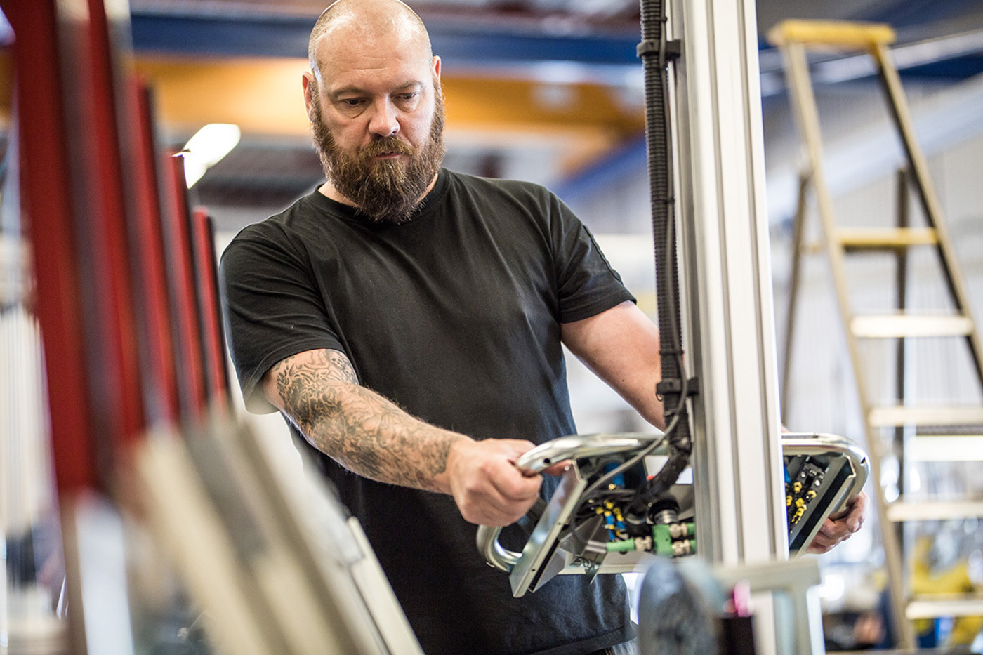 Experienced operator using ergonomic lifting equipment